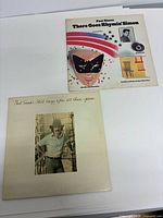 Front covers of both Paul Simon LPs