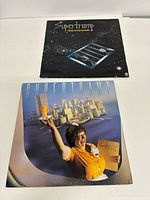 Front covers of both Supertramp albums