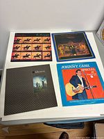 Four LPs: horse silhouette cover, illustrated blue-border cover, Ultravox Lament, Johnny Cash Special 20