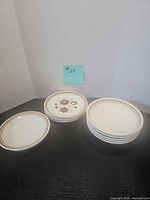 Stacked view showing all 11 dinnerware pieces