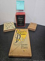 Group shot showing all four book items