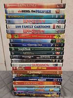 Full stack of 23 DVD cases showing spine titles