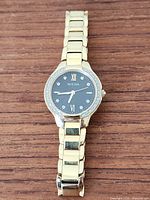 Full view of Bulova 98R22 watch laid flat