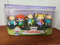 Front view of sealed Rugrats figure set showing all five figures