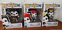 Front view of three sealed Funko Pop boxes #161-163