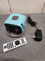 Projector, remote and power adapter overview