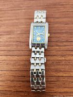 Front view showing dial, bracelet, and overall style