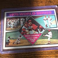 Front of card in plastic sleeve featuring 1975 World Series graphics