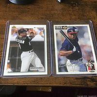 Fronts of both Bo Jackson Upper Deck cards in top loaders