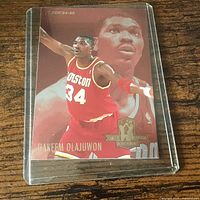 Front of card in top loader on table