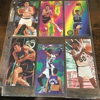 Full view of six cards in binder sleeve