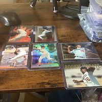 Six sleeved Hideo Nomo cards on tabletop