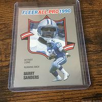 Front view of 1990 Fleer All-Pro Barry Sanders card in holder