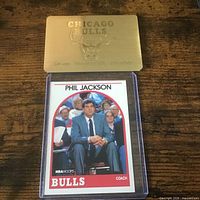 Full view of Phil Jackson card in sleeve with Bulls metal plate above