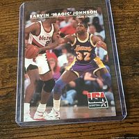 Front of Magic Johnson trading card in protective case