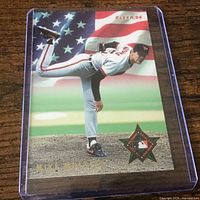 Front of Mike Mussina Fleer 1994 card in protective sleeve