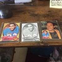 Three O.J. Simpson cards side by side
