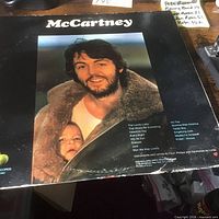 Front jacket with Paul McCartney holding child