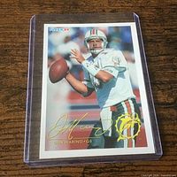 Front of Dan Marino Fleer 1994 card in clear plastic sleeve