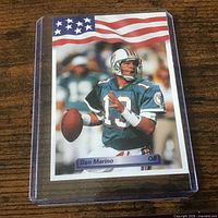 Front of Dan Marino trading card inside rigid sleeve