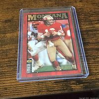 Front view of Joe Montana trading card in protective case