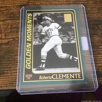 Front view of Roberto Clemente Golden Moments trading card in plastic case