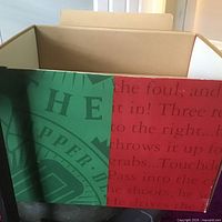 Cardboard box that accompanies the signed football