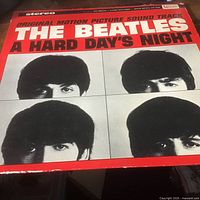 Front album cover showing title and artist