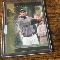 Front of sleeved Tiger Woods Upper Deck card