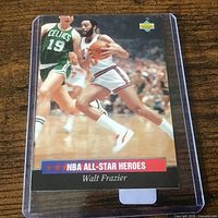 Card front in protective sleeve with full view of image and branding