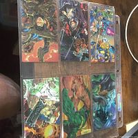Full binder sleeve showing six WildC.A.T.s trading cards