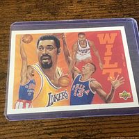 Front of the Upper Deck Basketball Heroes Wilt Chamberlain card showing illustrated images and Upper Deck logo