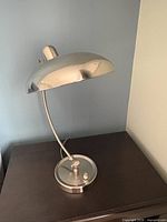 Full view of lamp at highest setting on night table