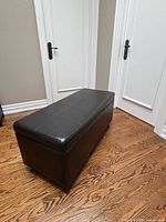 bench closed showing leather upholstery and stitching