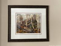 Framed Tom Thomson limited edition print on wall