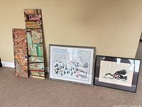 Group shot of all four artworks leaning against wall