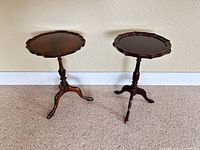 Both cherry pedestal tables front view
