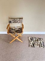 Chair front view with spare canvas panels on floor