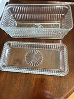 base and lid top view showing ribbed sides and starburst center