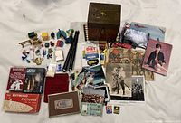 Full lot overview showing games, banknotes, photographs, box and toys