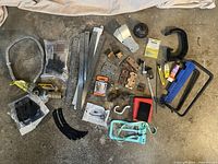 All items laid out on floor full view