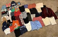 Full lot layout showing variety of garments