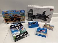 Group shot showing all sealed toy kits and Playmobil boxes