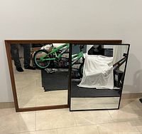 Both mirrors front view showing wood and metal frames