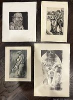 Four etchings laid out showing overall lot contents
