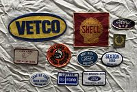 Front view of all eleven patches showing logos and shapes