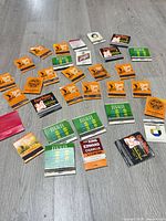Spread of approx 30 vintage advertising matchbooks including Sheraton Maui, Kauai Surf, Coco Palms and others