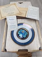 Plate in original box with COA and insert