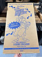 Front of flat cardboard sleeve showing printed graphics and title