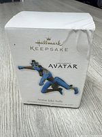 Front of Hallmark Keepsake Avatar Jake Sully ornament box